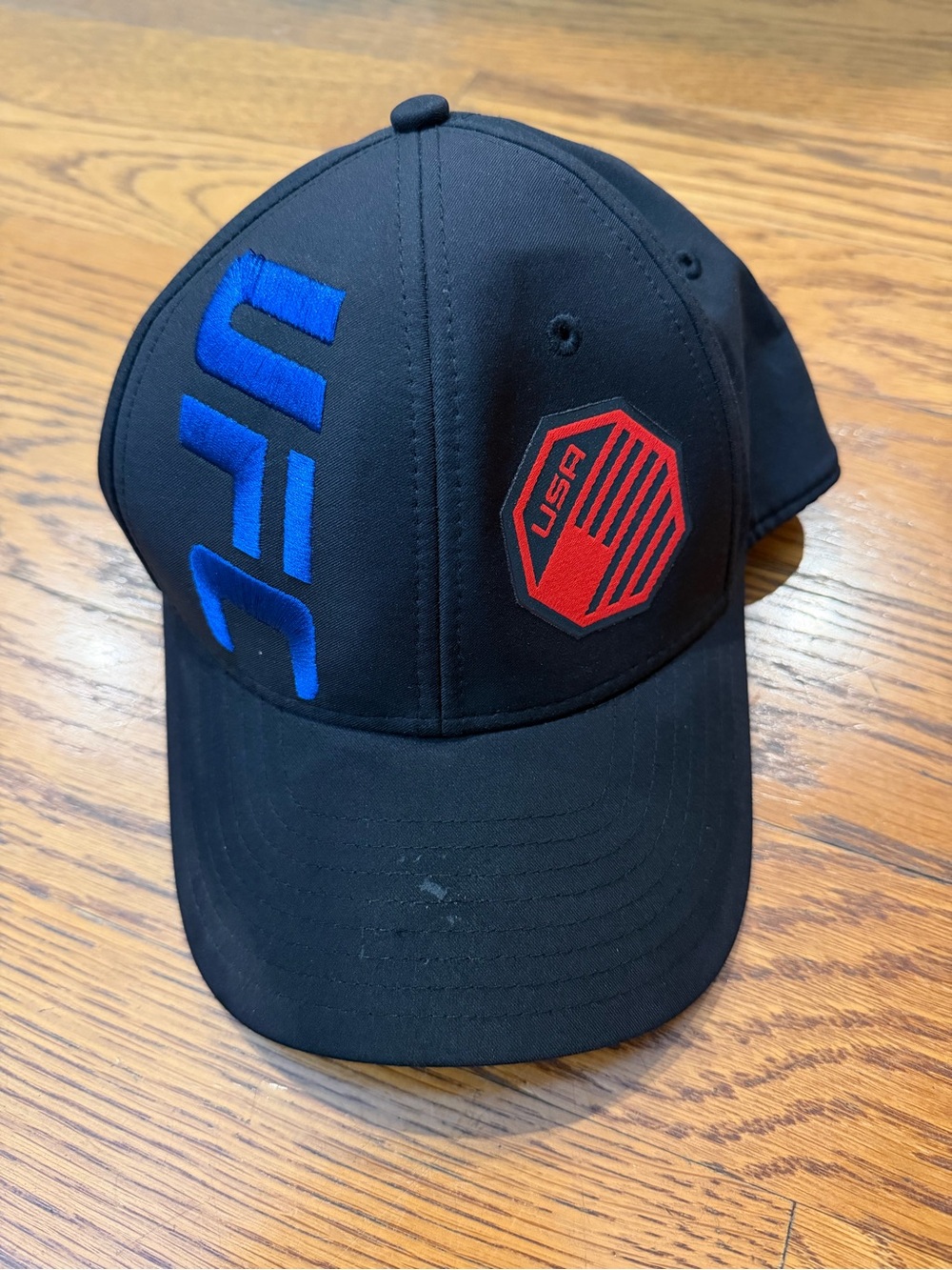 Reebok Black Cap with Blue Embroidered UFC Logo and Red USA Patch